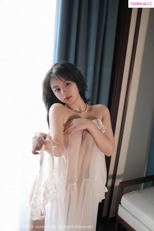   [XiuRen]高清写真图 2024.02.19 No.8106 沈思怡 妩媚美腿第25张图片